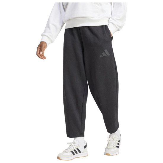 Adidas Γυναικείο παντελόνι φόρμας Essentials Contemporary Logo Fleece Barrel Pants Adidas Γυναικείο παντελόνι φόρμας Essentials Contemporary Logo Fleece Barrel Pants